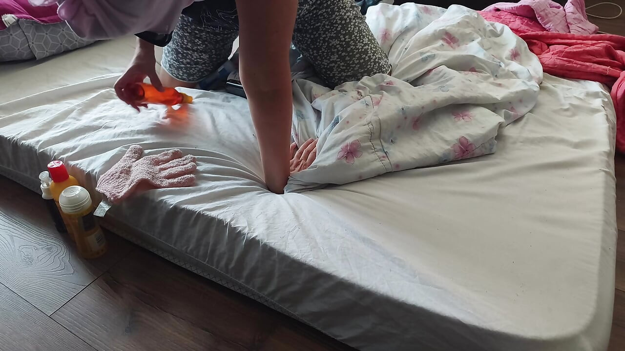 Foreplay in the bedroom with an amateur couple.