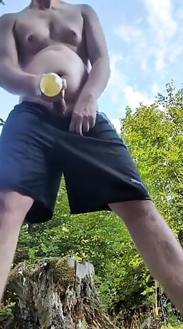 Pissing in a condom and squirting sperm into it