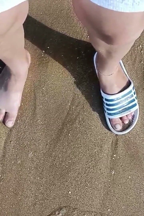 Feet and the Sea Extra Slowmotion - One Foot Barefoot and Foot in Slide - Great Feet in Sea