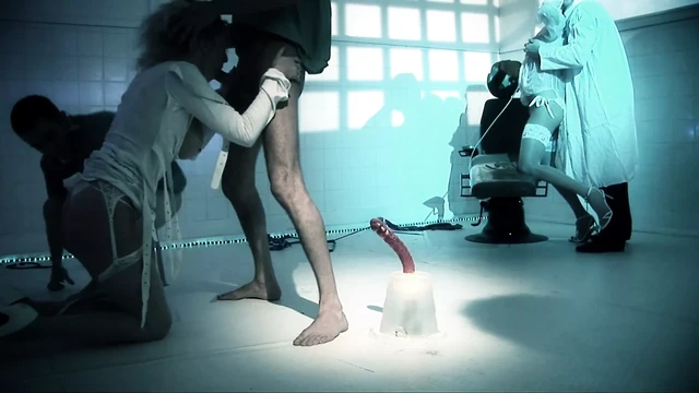 Blondie in a straightjacket has threesome with two doctors