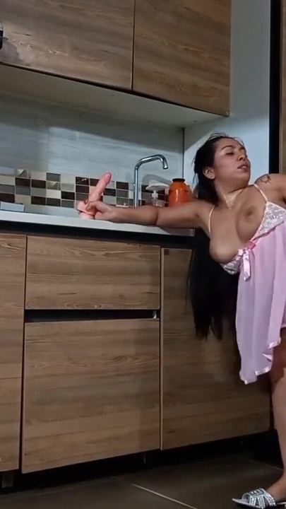 A sexy brunette got fucked in the kitchen while wearing seductive lingerie. | Clip 1