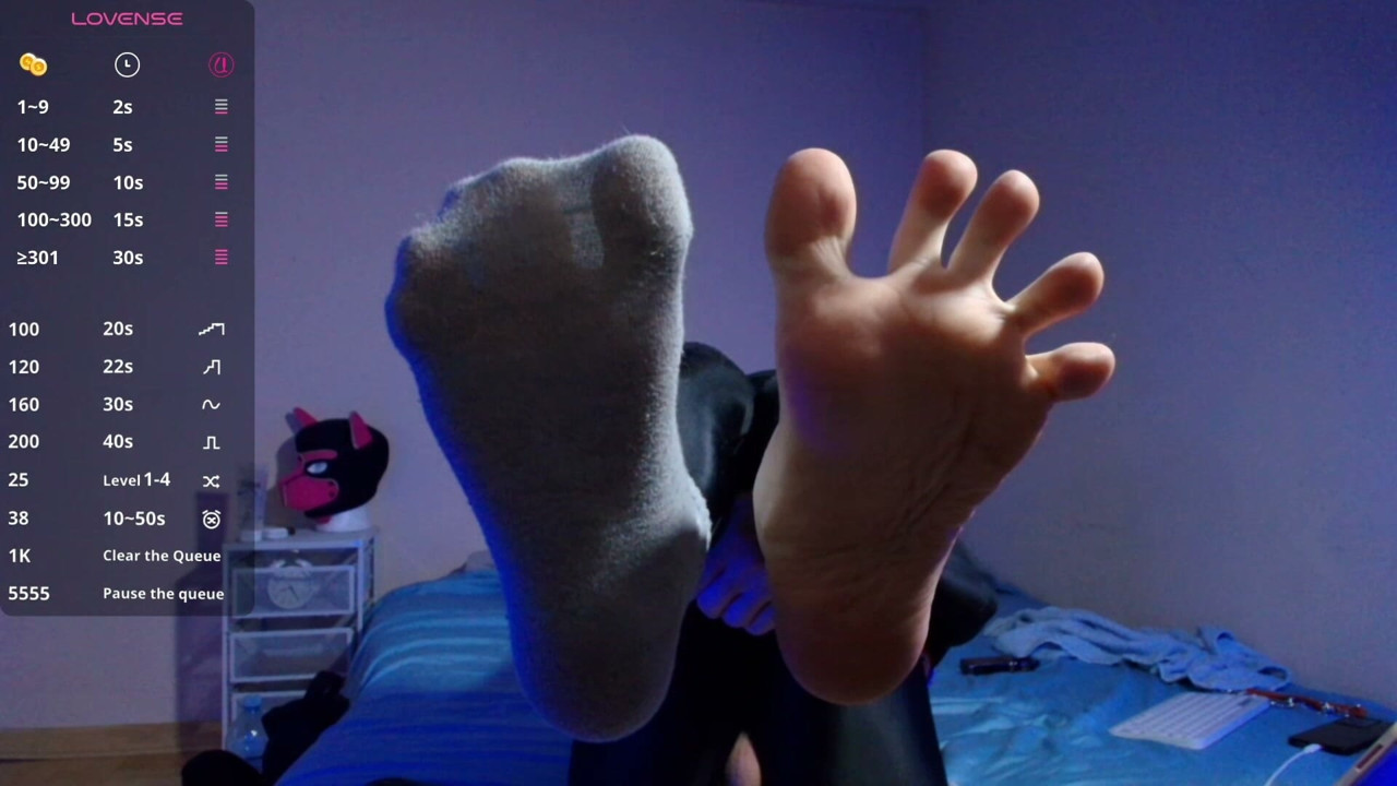 Puppy keeps teasing you with his socks and bare paws