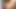 Entzückendes weißes Mädchen, das schwarz lutscht
