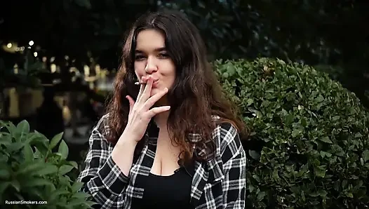 Sweet and Busty Russian Babe Smoking Cigarette in Nature