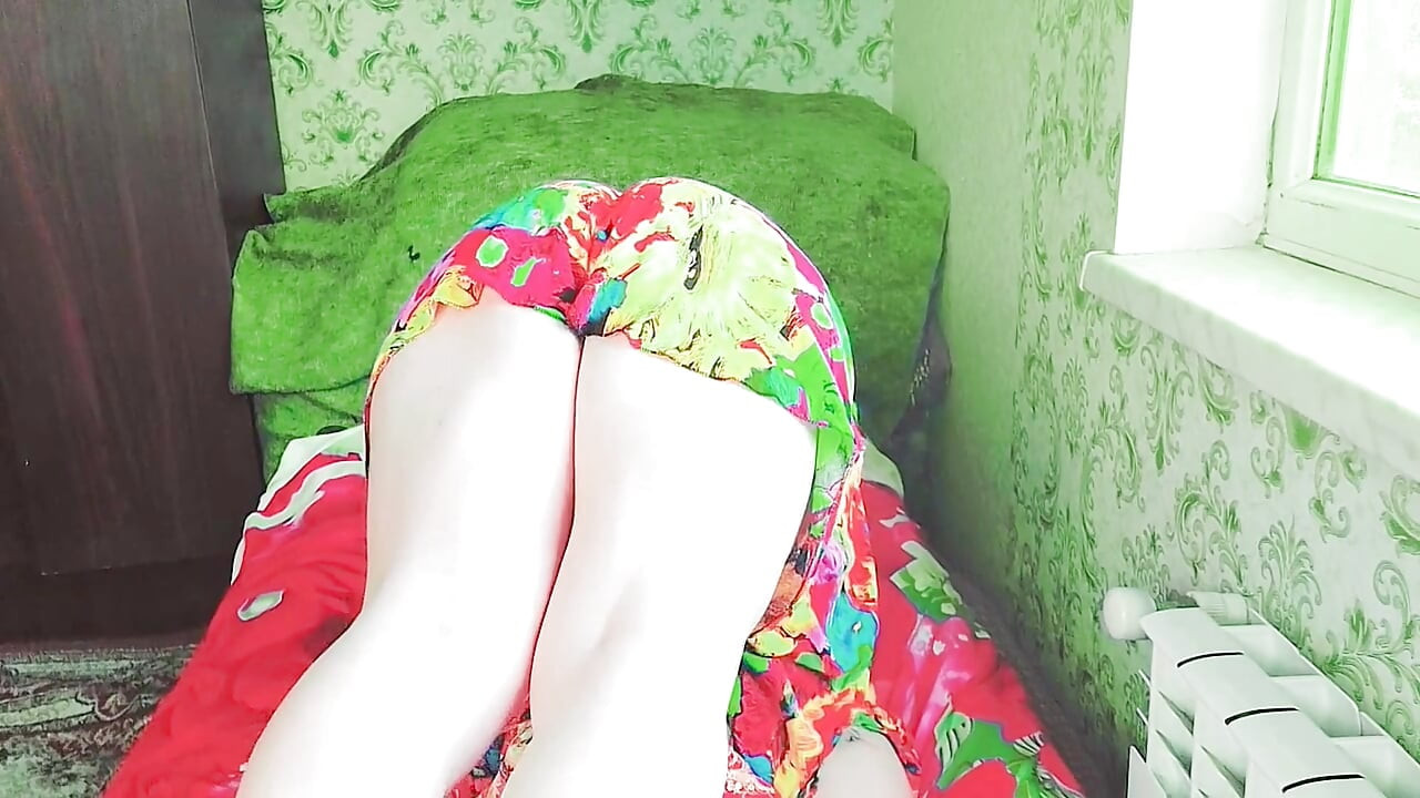 Cute sissy wearing fluffy earmuffs in cozy sweater