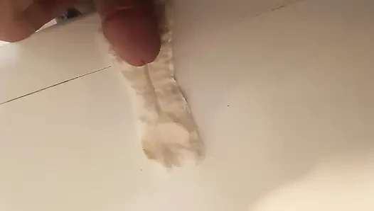 Ejaculation on wife's sanitary napkin