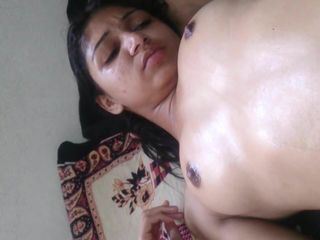 India girl getting an oily body massage