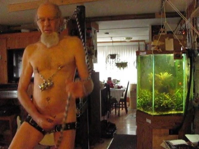 Masturbating on the Slave Post