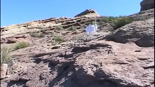 Astronaut stud lands on a planet where a blonde primitive babe sucks his cock outdoors