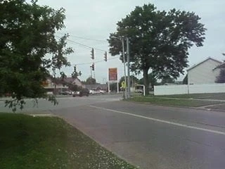 1992 gillig bus going through city in evansville,indiana