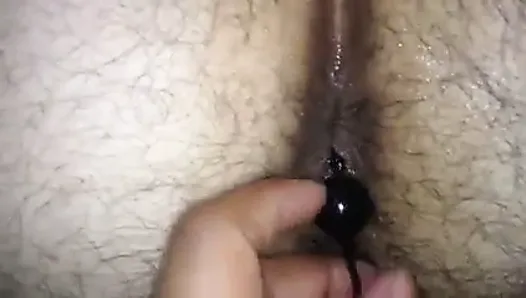 Pulling anal beads out of his ass!