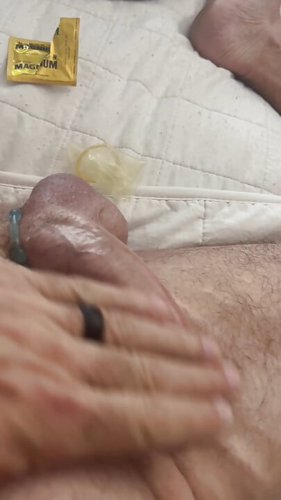 Condom, cock ring, and some cum