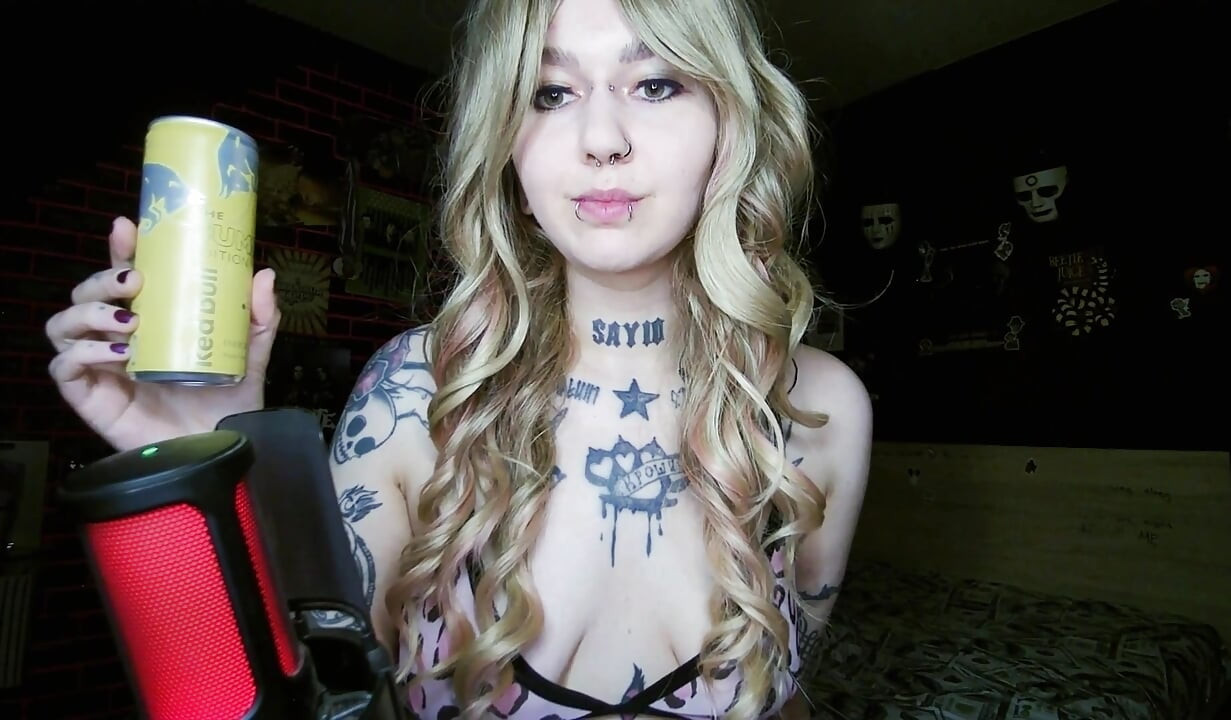 Alternative blonde drinking and burping