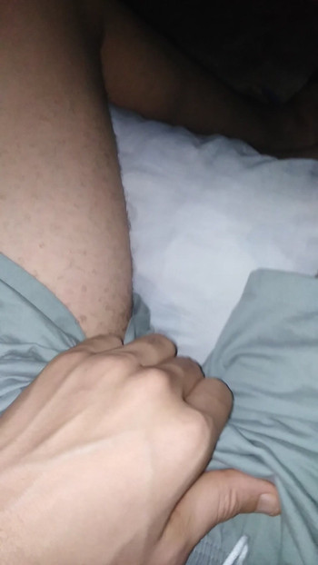 Masturbating