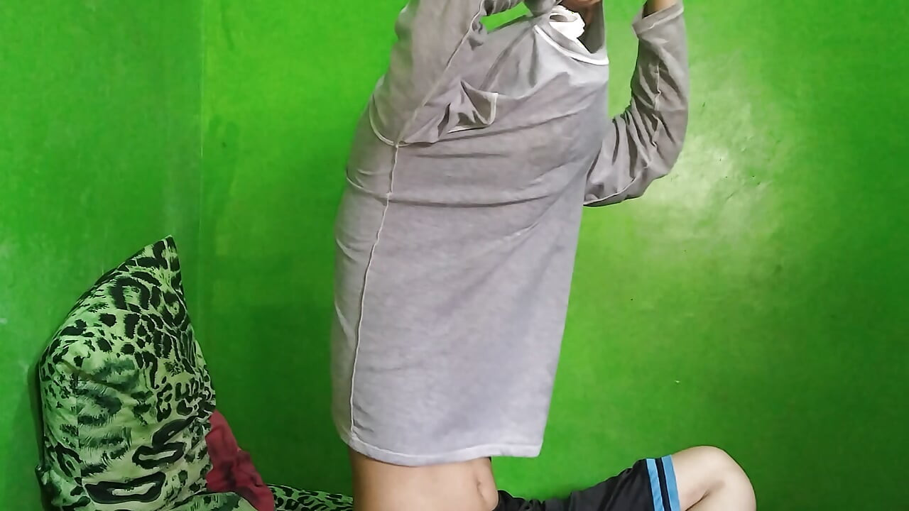 playing alone in the room with a modified teapot bottle