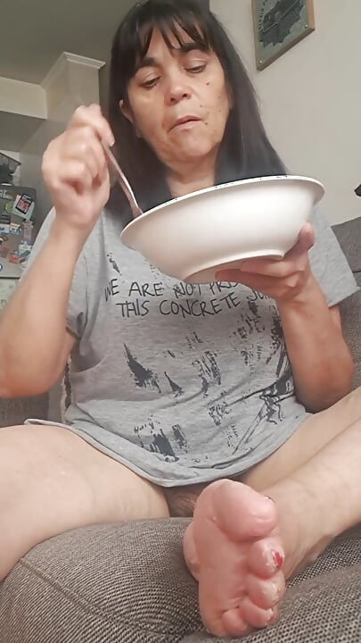MILF Spreading Her Legs While Eating