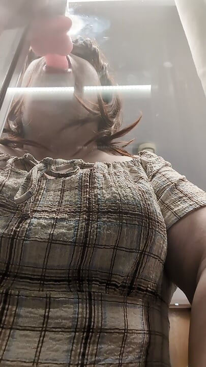 Kelli completes her Deep throat training at an open window