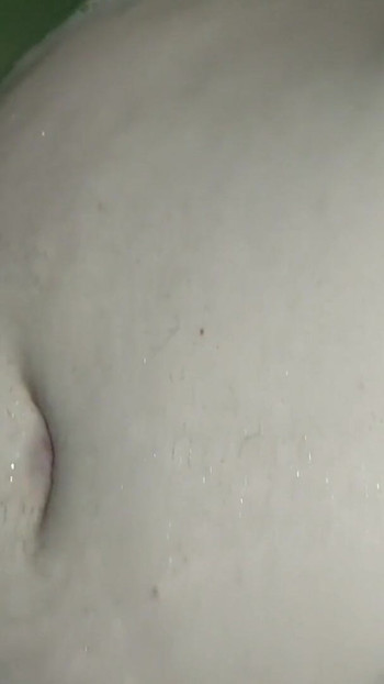 Memorable moment from "Sexy bbw girlfriend gets her nice big belly and big tits massaged in the bathtub. He gets his big"