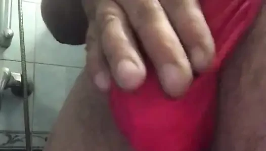 Red thong made all slippery from