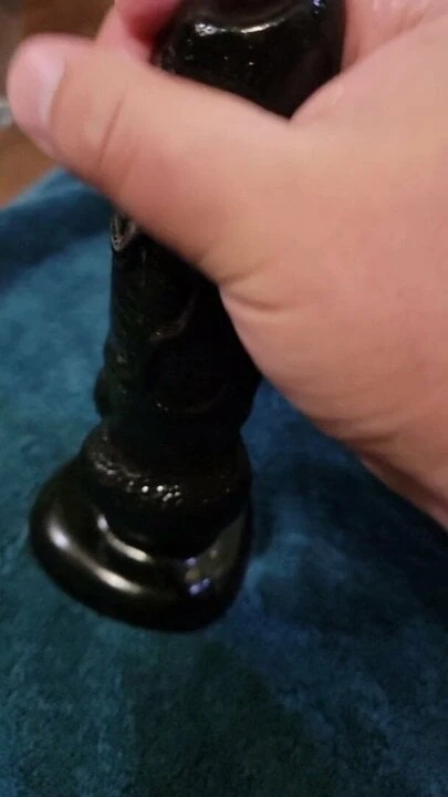 Dildo handjob