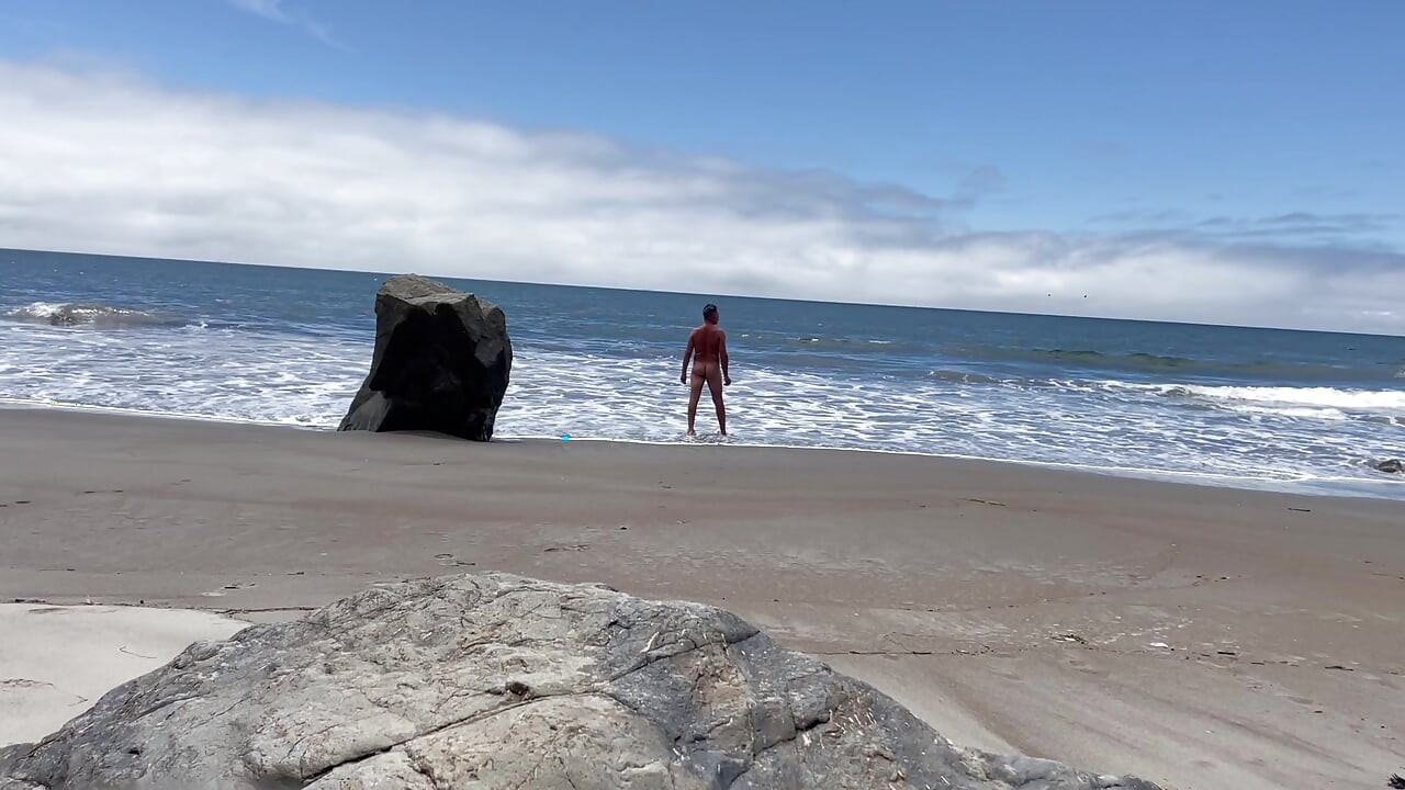 Nude rocky beach swim ocean