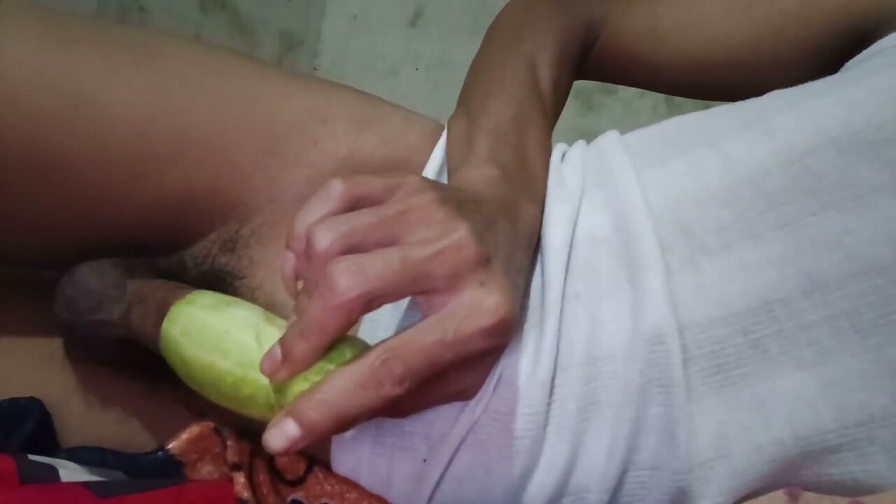 Jujut Expression Playing Solo Using Cucumbers That Have Been Hollowed Out