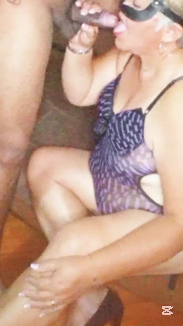 Mature milf giving a good cock sucking to her young lover