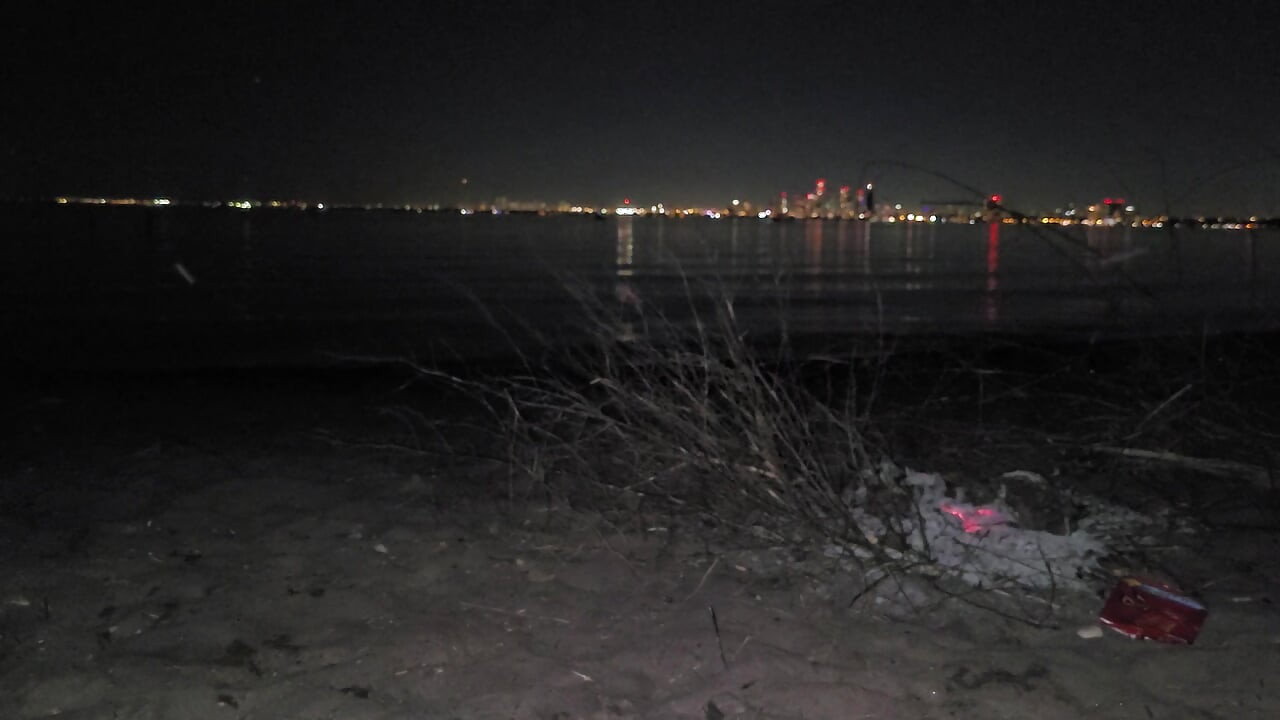 oiled masturbating and piss on the nude beach at night