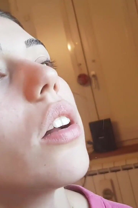 Tempting Italian girl smokes a cigar in a close up video