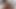 ティーガン・ライリーが毛むくじゃらのマフでカメラマンをからかう