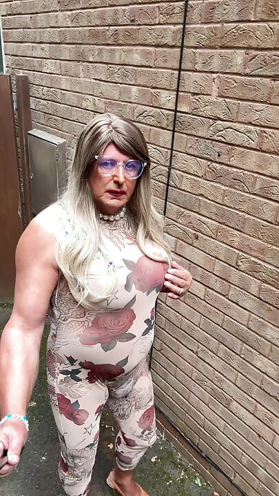 Sexy Crossdresser kellycd2022 in sexy floral see thru catsuit and heels