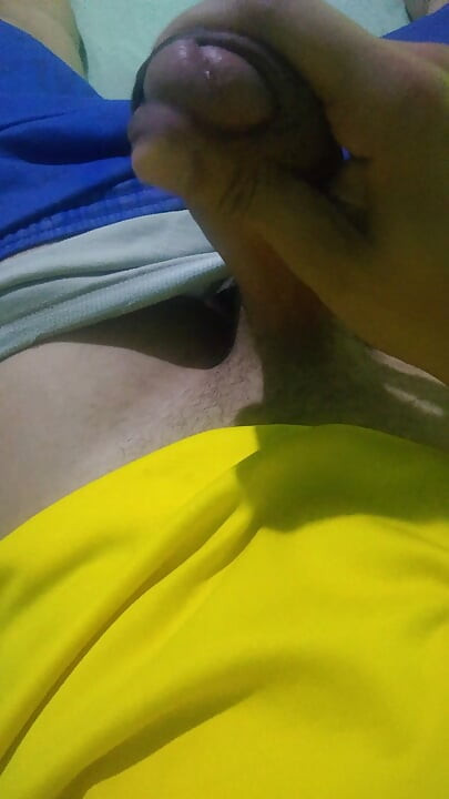 Pov young Brazilian guy masturbating big thick dick wearing the Brazilian national team uniform