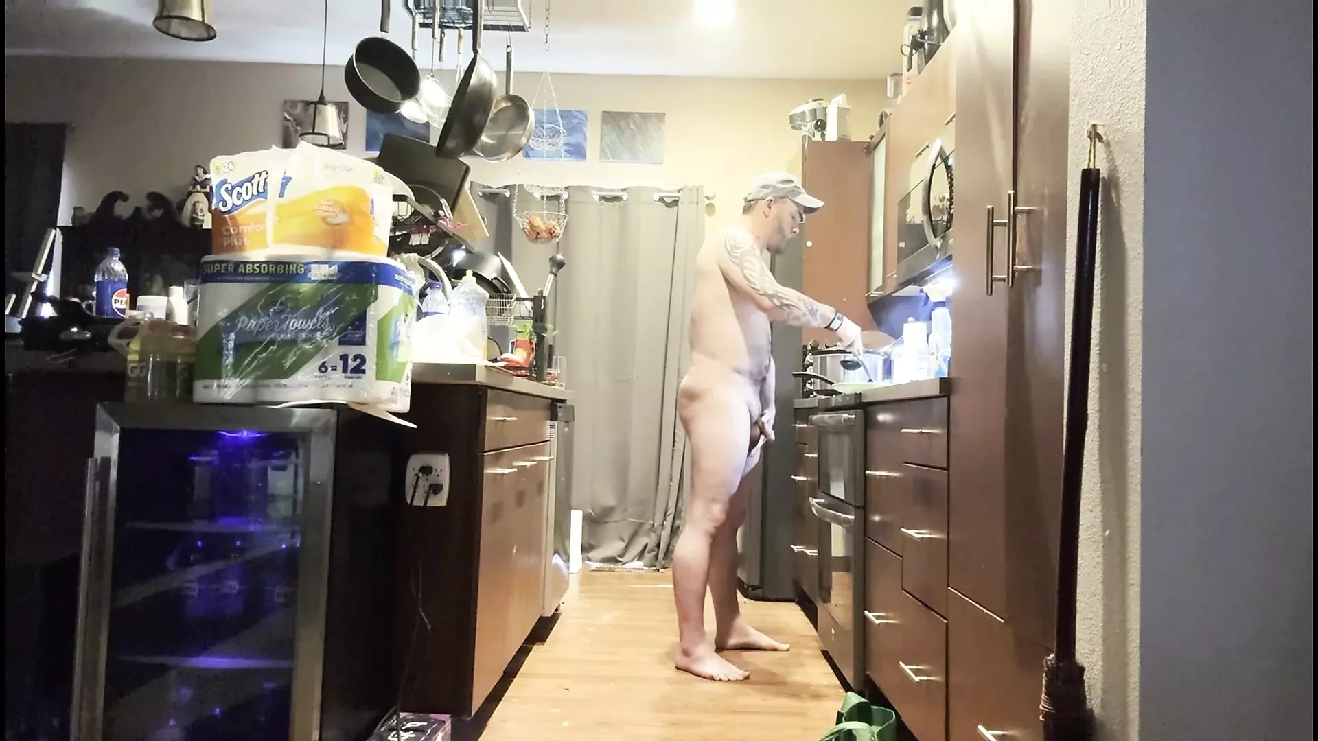 Making breakfast naked with morning wood