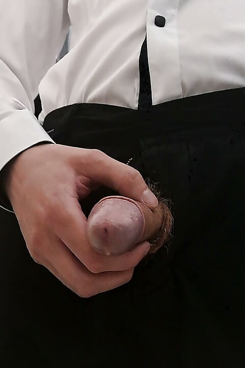 Man with a thick hairy cock pissing