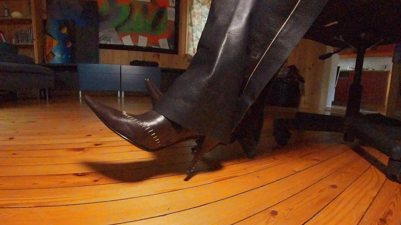 Leather chaps and pointy boots