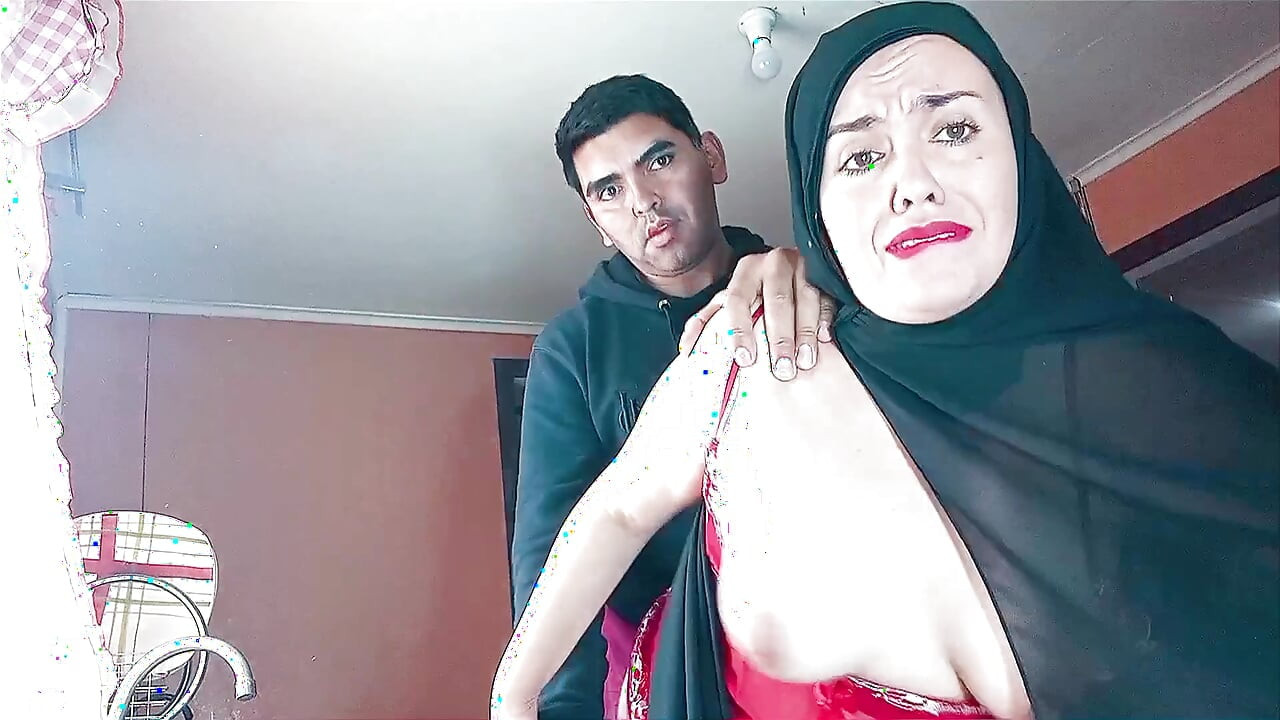 Muslim stepmother in a hijab fucking in the kitchen