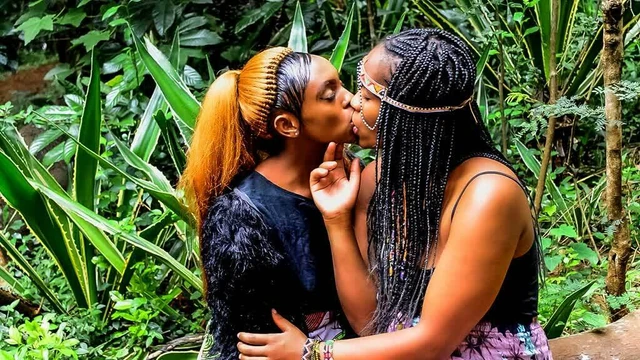 African festival outdoor lesbian make-out