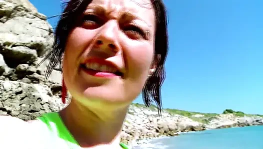 brunett babe taken to the beach to fuck