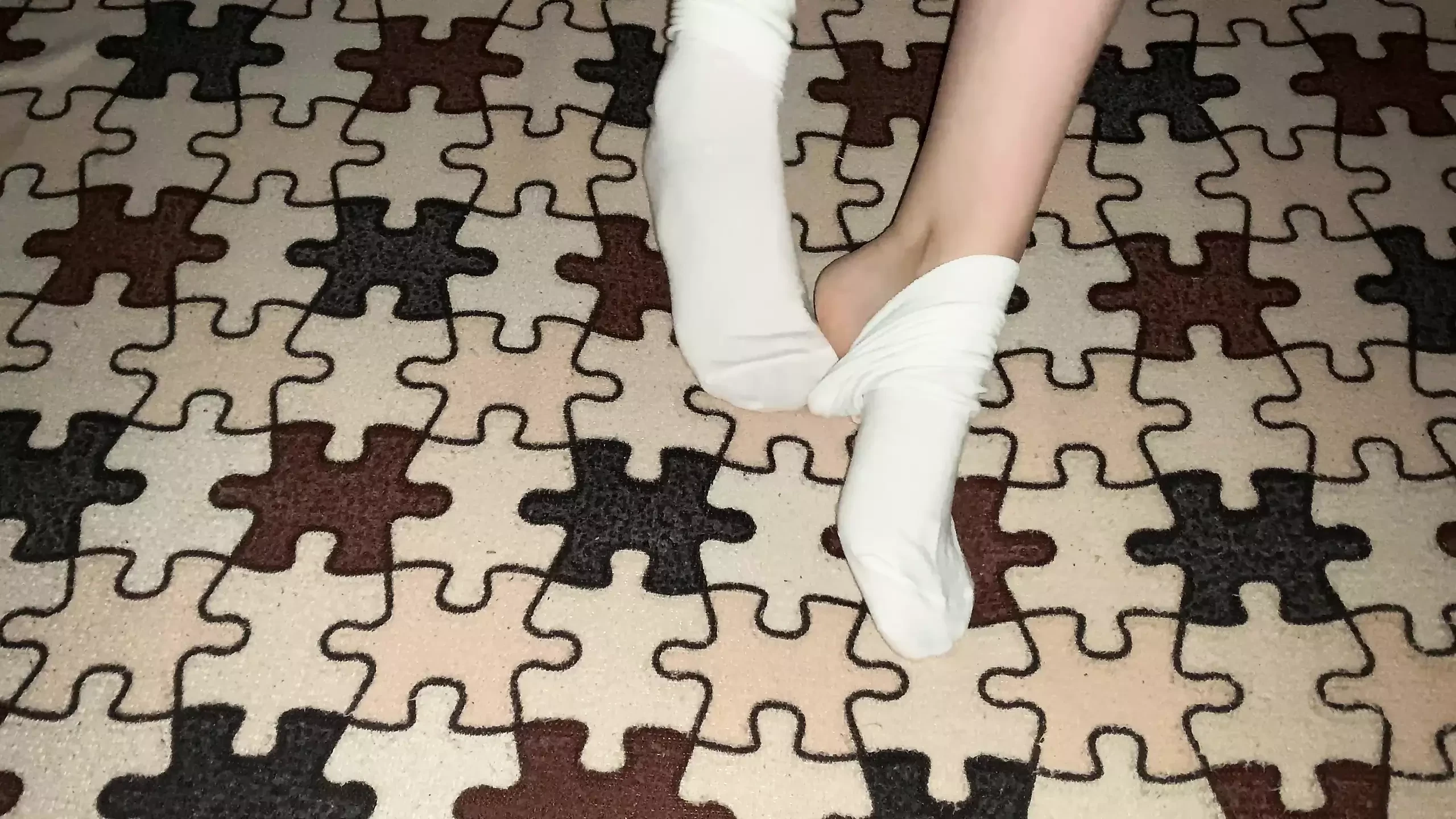 Gloria Gimson caresses her sexy feet in white cotton socks