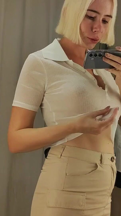 Sexy blonde tries on a teacher's uniform. Sexy clothes fitting Hot babe tries on sexy clothes and flashes her boobs. | Clip 1