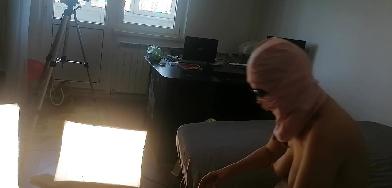 Amateur woman has fun trying on clothes and cutting them. Amateur woman vacuuming naked in the house.