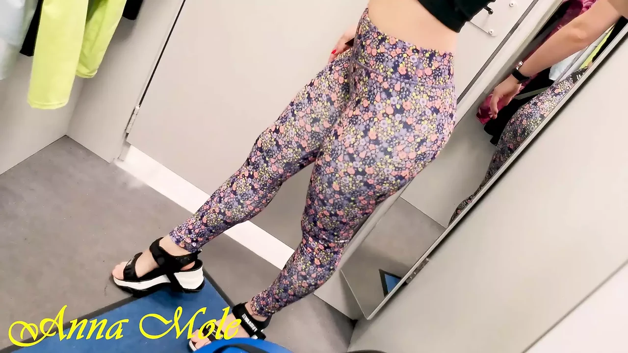 Fitting room, a slender beauty with an elastic ass arranged a fitting for sports leggings Anna Mole