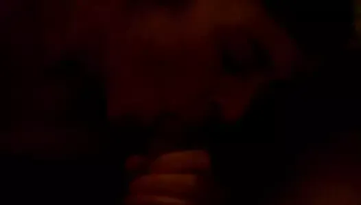 Mature wife sucking cock in darkened room