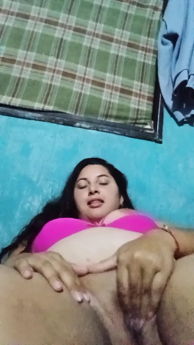 Chubby Latina with big tits chews her rich wet pussy
