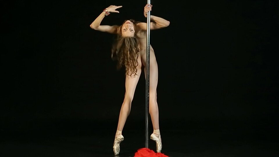 Gorgeous nude ballerina Annett A dances on a pole. Girl dancer spreads her flexible long legs wide