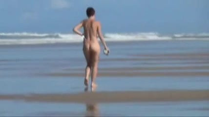 Old girlfriend walking nude on the beach