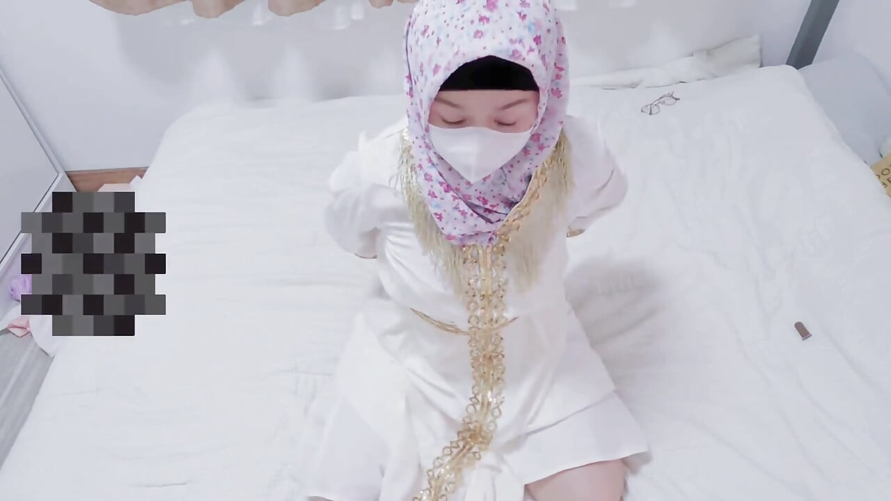 A Malaysian Hijabi Girl Teasing with White Abaya Showing off Her Ass