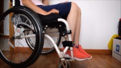 Tetraplegic girl gets spasm on both legs while sitting in he