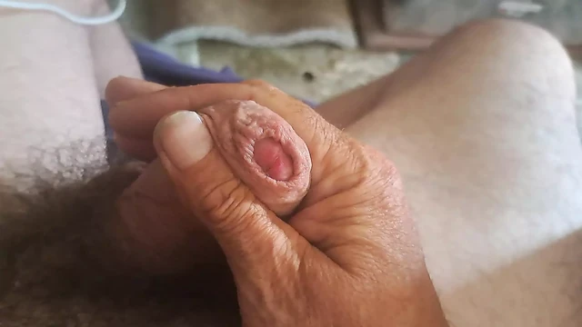 An obese old man having a nice wank