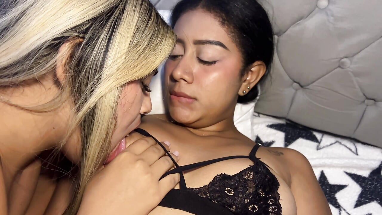 Blonde and blackhead play with their pussies in passionate lesbian sex